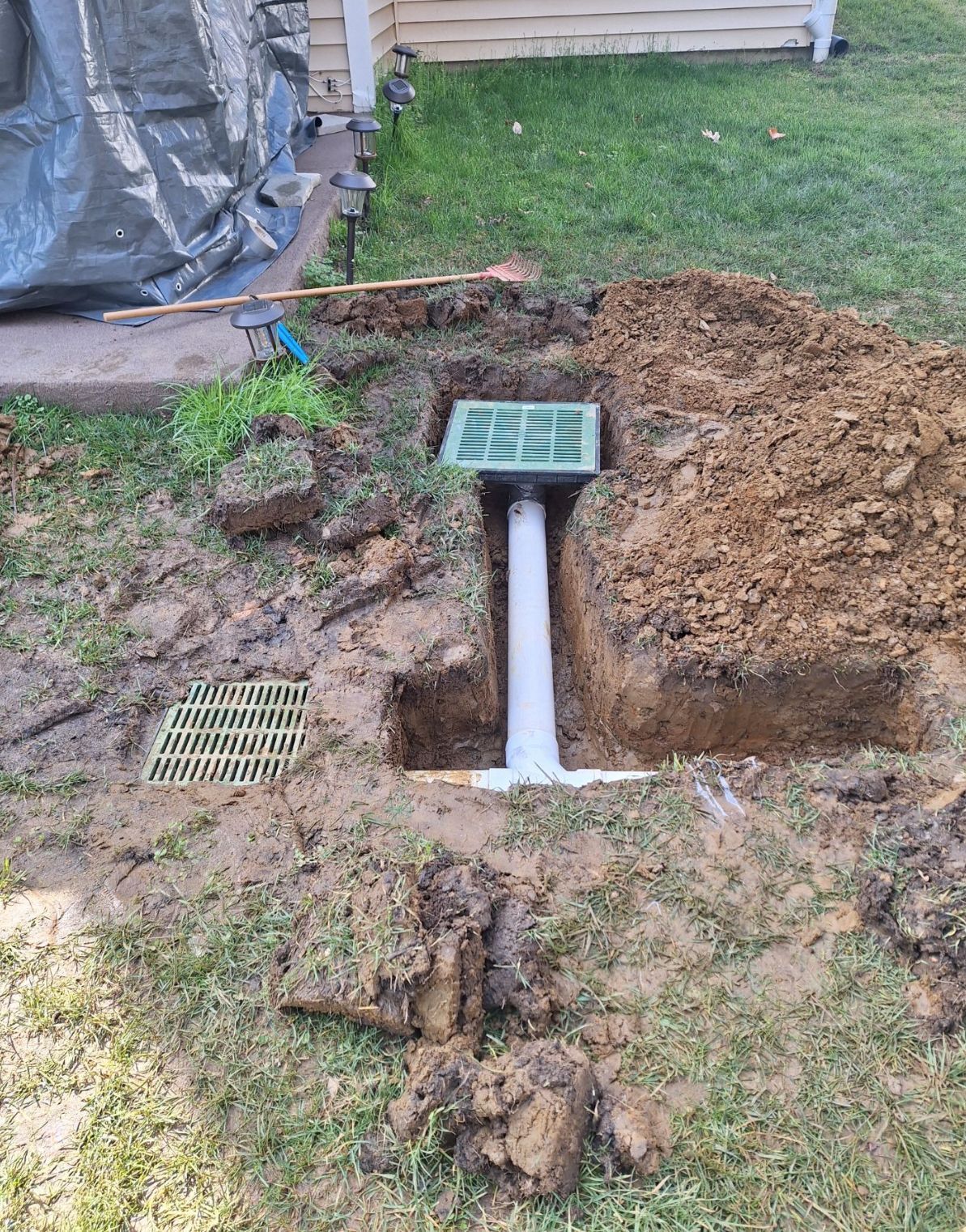 yard drainge catch basin being installed in Maryland